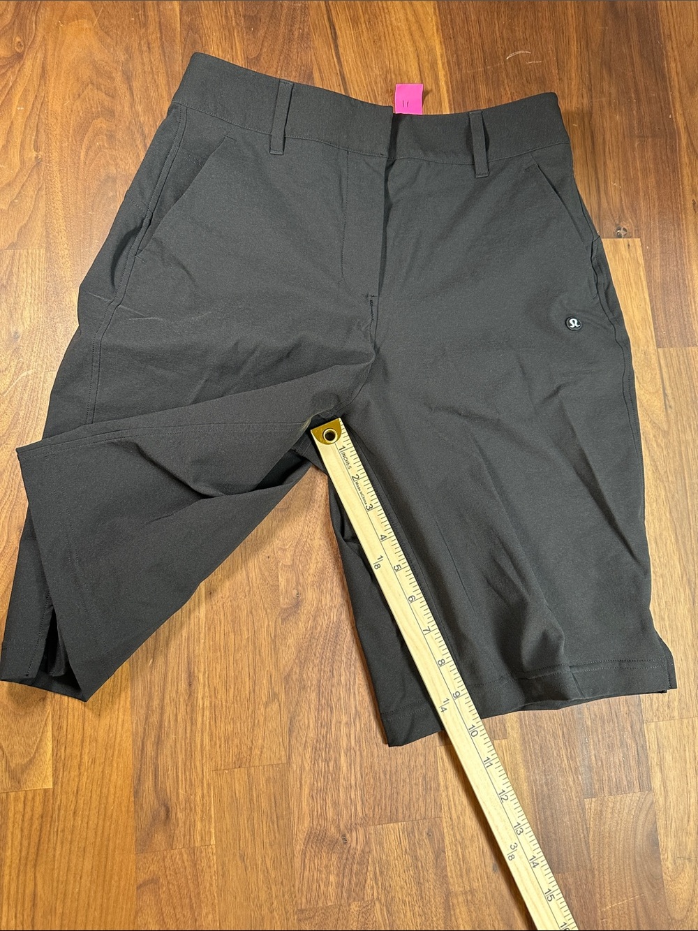 Lululemon women’s Black Flat Front Shorts Belt Loops Pockets Size 24 waist